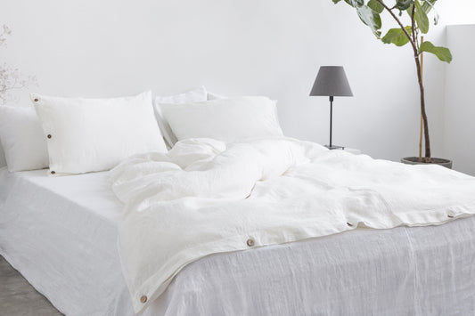 White linen duvet cover with coconut buttons