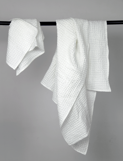 Set of linen waffle robes with towels